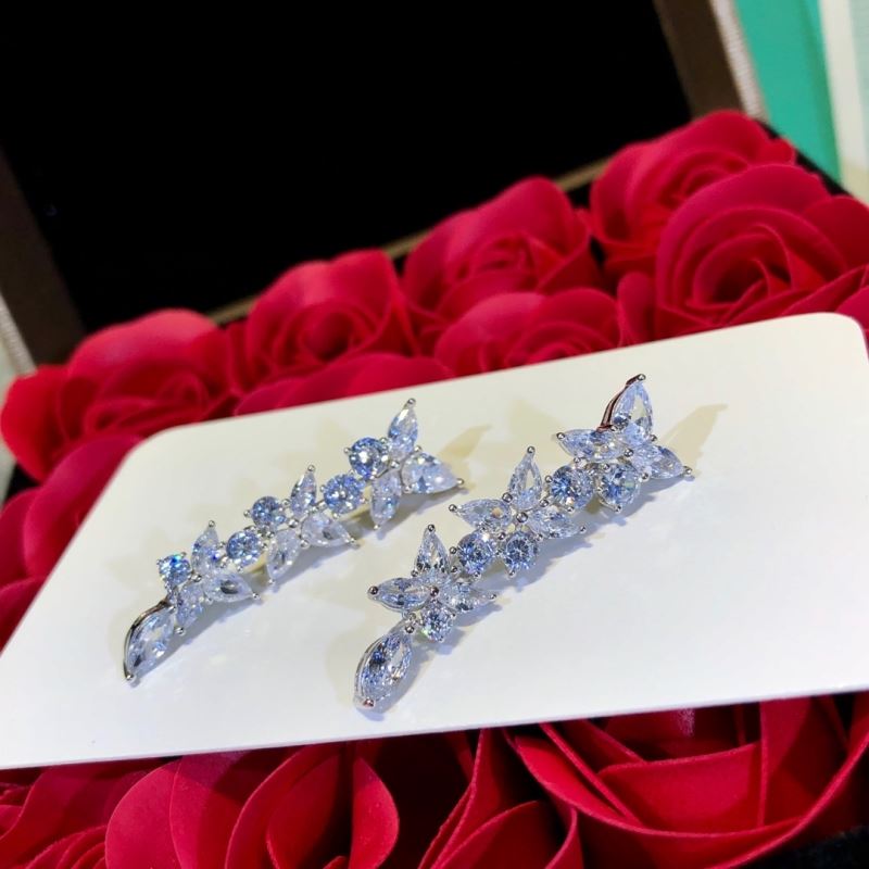 T*f*ny earrings
